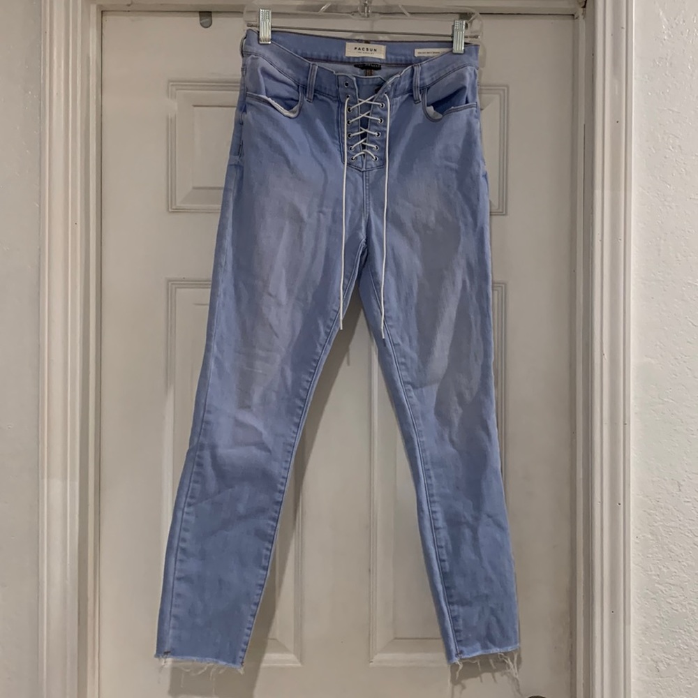 SOLD!! Light blue wash jeans with lace-up closure. “Jeggings”